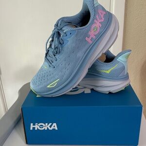 Hoka Light Blue Running Shoes with Neon Accents